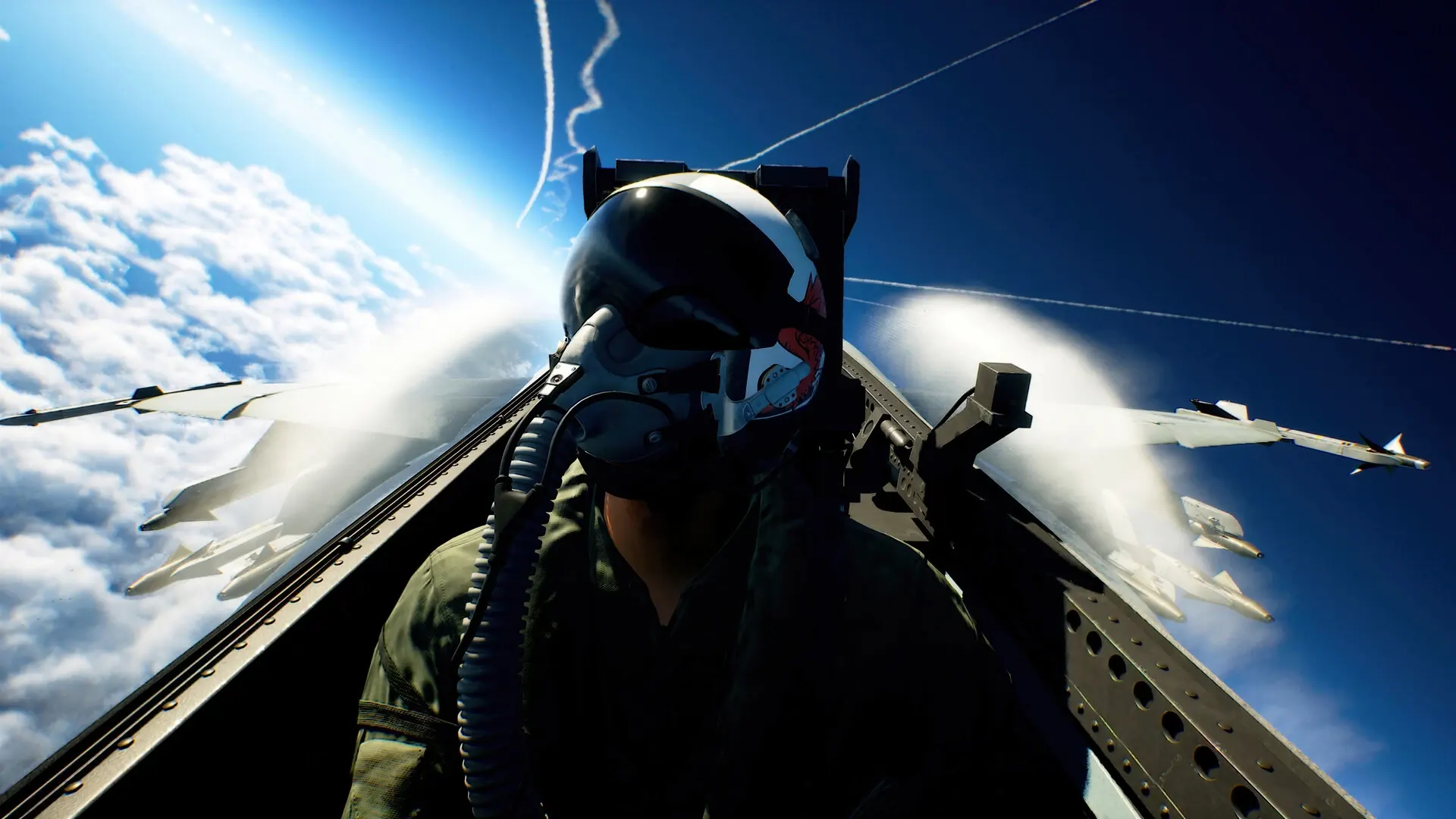 Ace Combat 8: Wings of Theve key art. A pilot in a white helmet and oxygen mask looks up from a fighter’s cockpit, with missiles under the wings and contrails across a deep blue sky.
